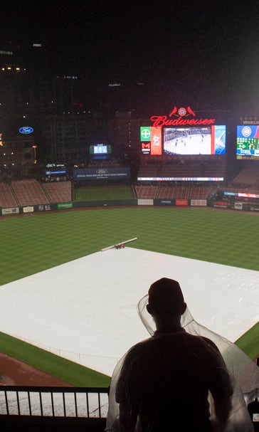 After long rain delay, Cardinals outlast Cubs 7-4